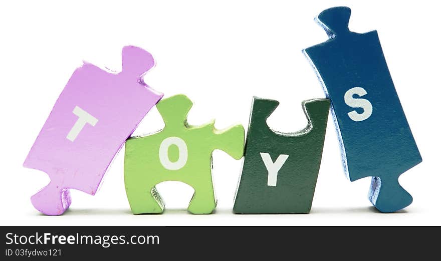 Wooden colored puzzle blocks sign. Wooden colored puzzle blocks sign