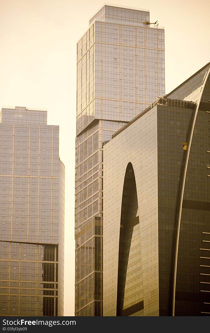 Modern buildings in Moscow downtown, lightly yellow toned