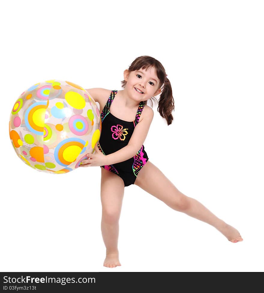 Adorable little girl in swimsuit playing with beach ball, isolated on white. Adorable little girl in swimsuit playing with beach ball, isolated on white