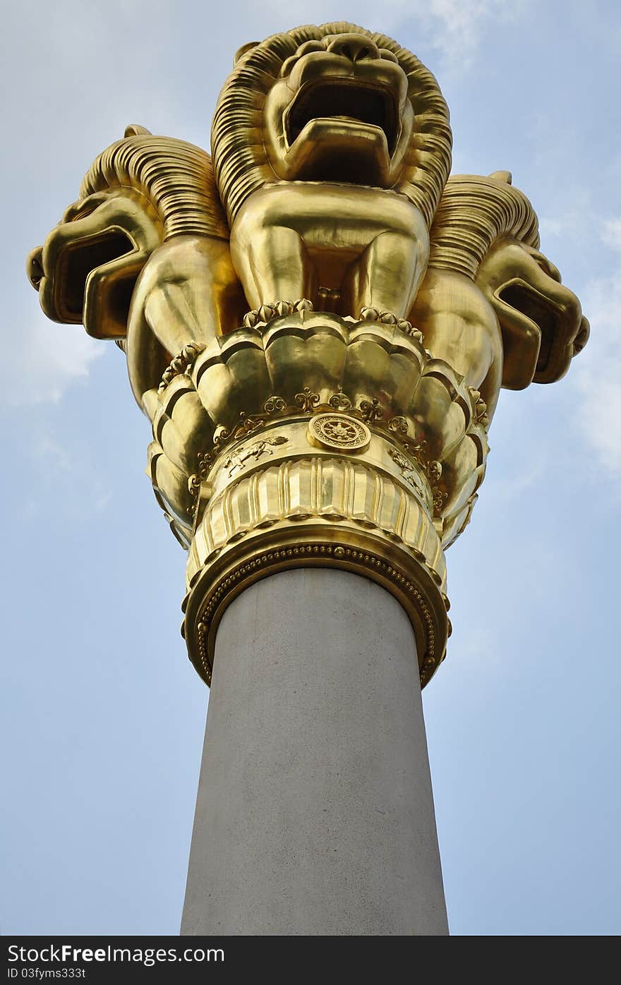 Three Golden Lions on the stone column. Three Golden Lions on the stone column