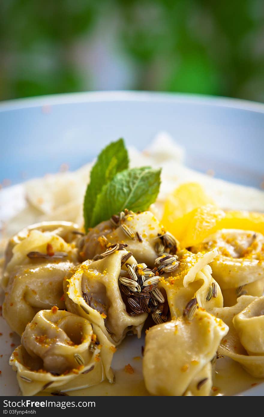 Tortellini with fennel, orange, mint, butter and Parmesan cheese. Tortellini with fennel, orange, mint, butter and Parmesan cheese.