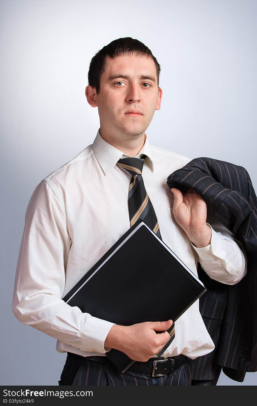 Businessman portrait in a jacket and tie