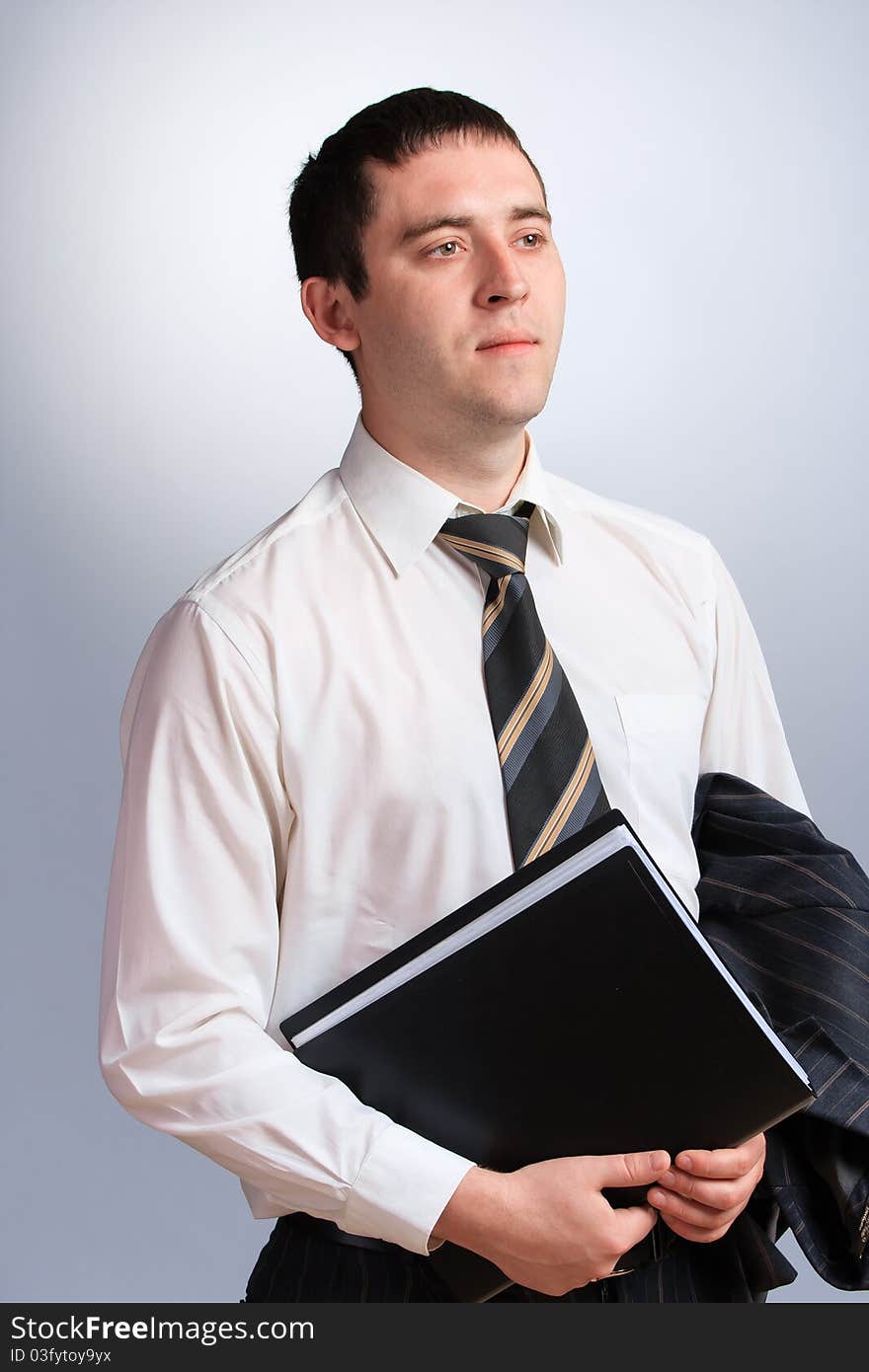 Businessman portrait in a jacket and tie