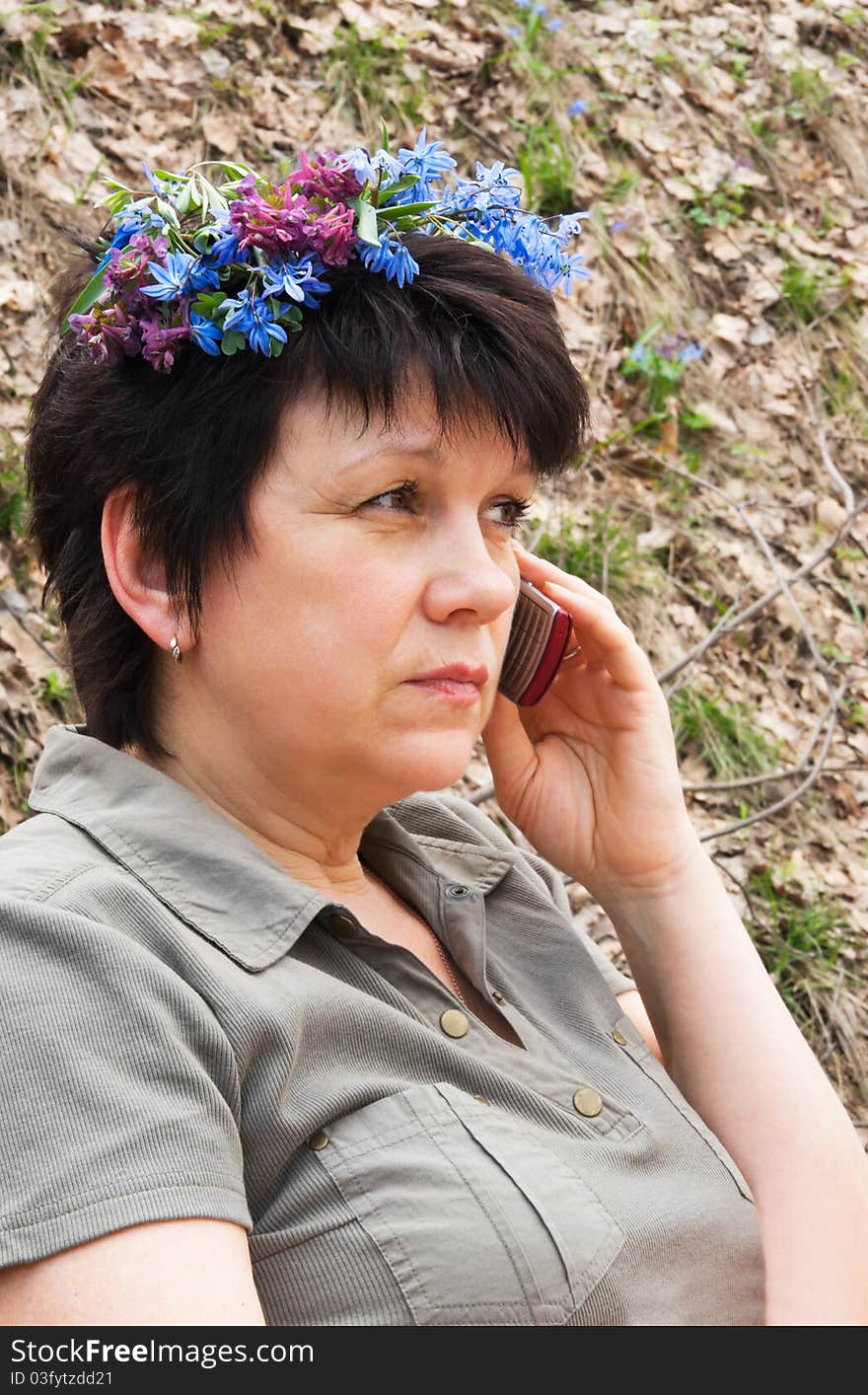 Woman With Phone In Nature