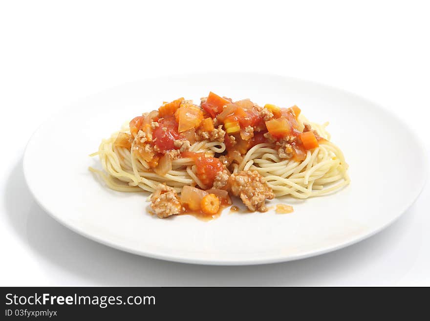 Spaghetti bolognese on dish isolated