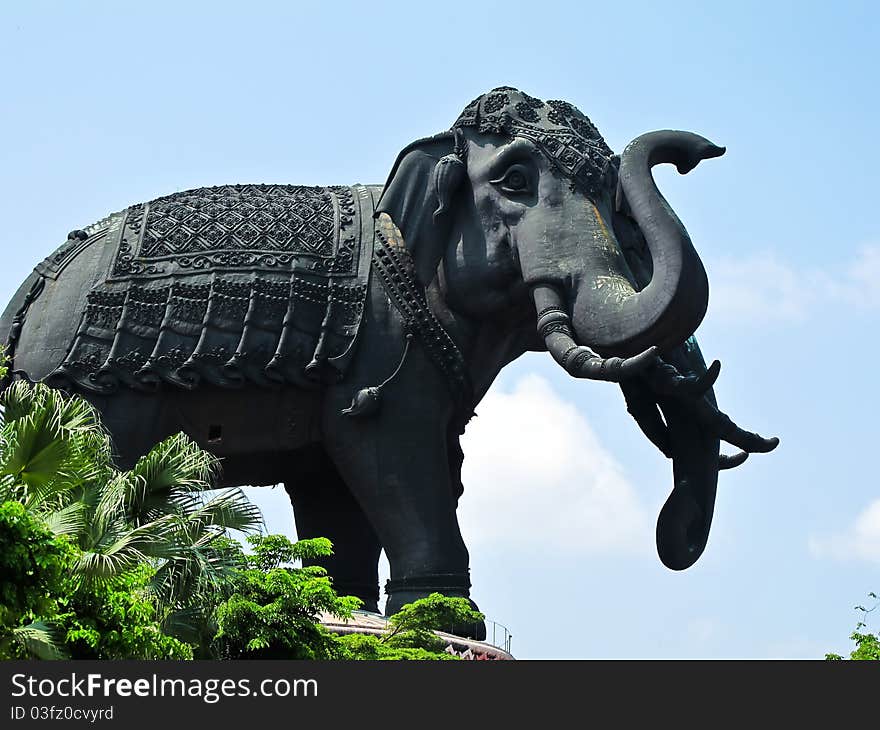 Big Elephant Status with blue sky in Samut Prakan near Bangkok, Thailand. An Erawan is a mythical elephant Status with three heads. Big Elephant Status with blue sky in Samut Prakan near Bangkok, Thailand. An Erawan is a mythical elephant Status with three heads.