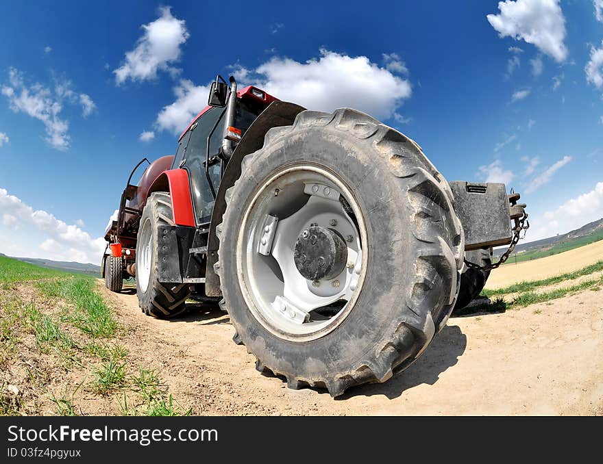 Tractor in the field beaten fisheye