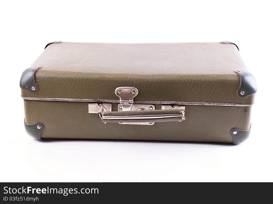 Battered old suitcase in studio on white background