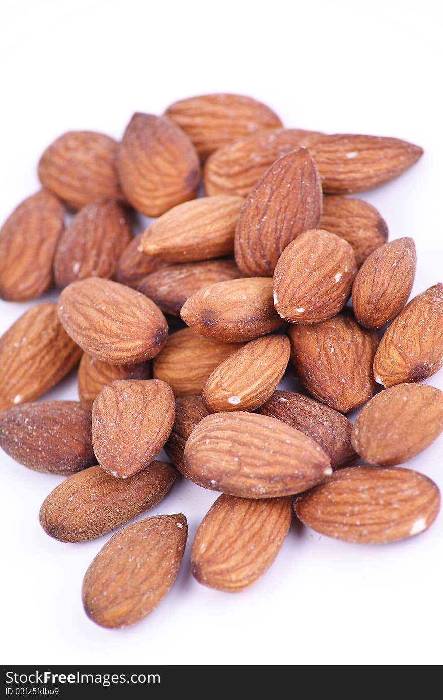 Almond nuts isolated on white background