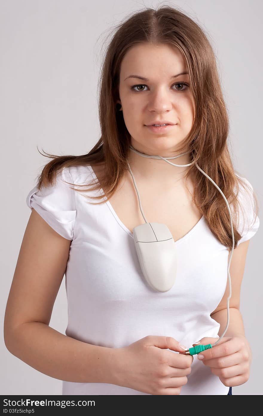 Girl with a computer mouse in the neck