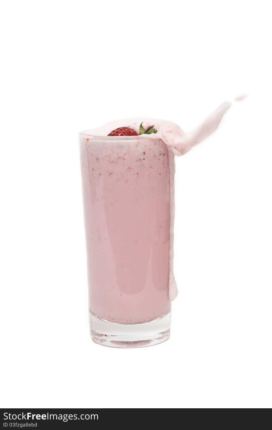 A Strawberry Splashing Into A Milkshake