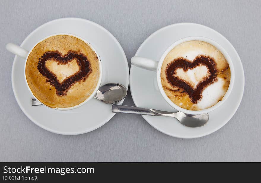 Two Cups of cappuccino with heart. Two Cups of cappuccino with heart