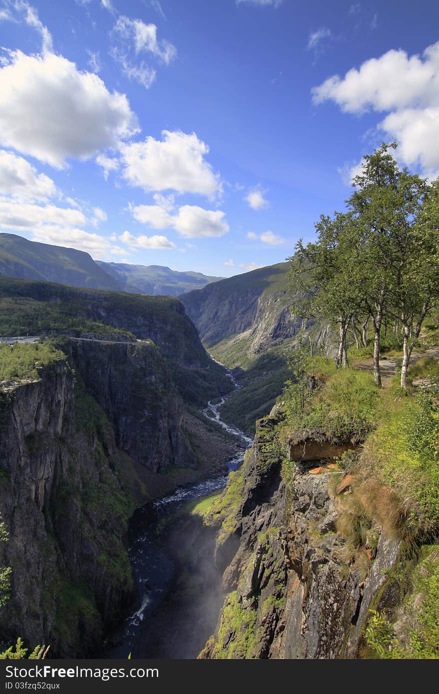 Panoramic view over a river in the Hardanger Fjord area, Norway. Panoramic view over a river in the Hardanger Fjord area, Norway.