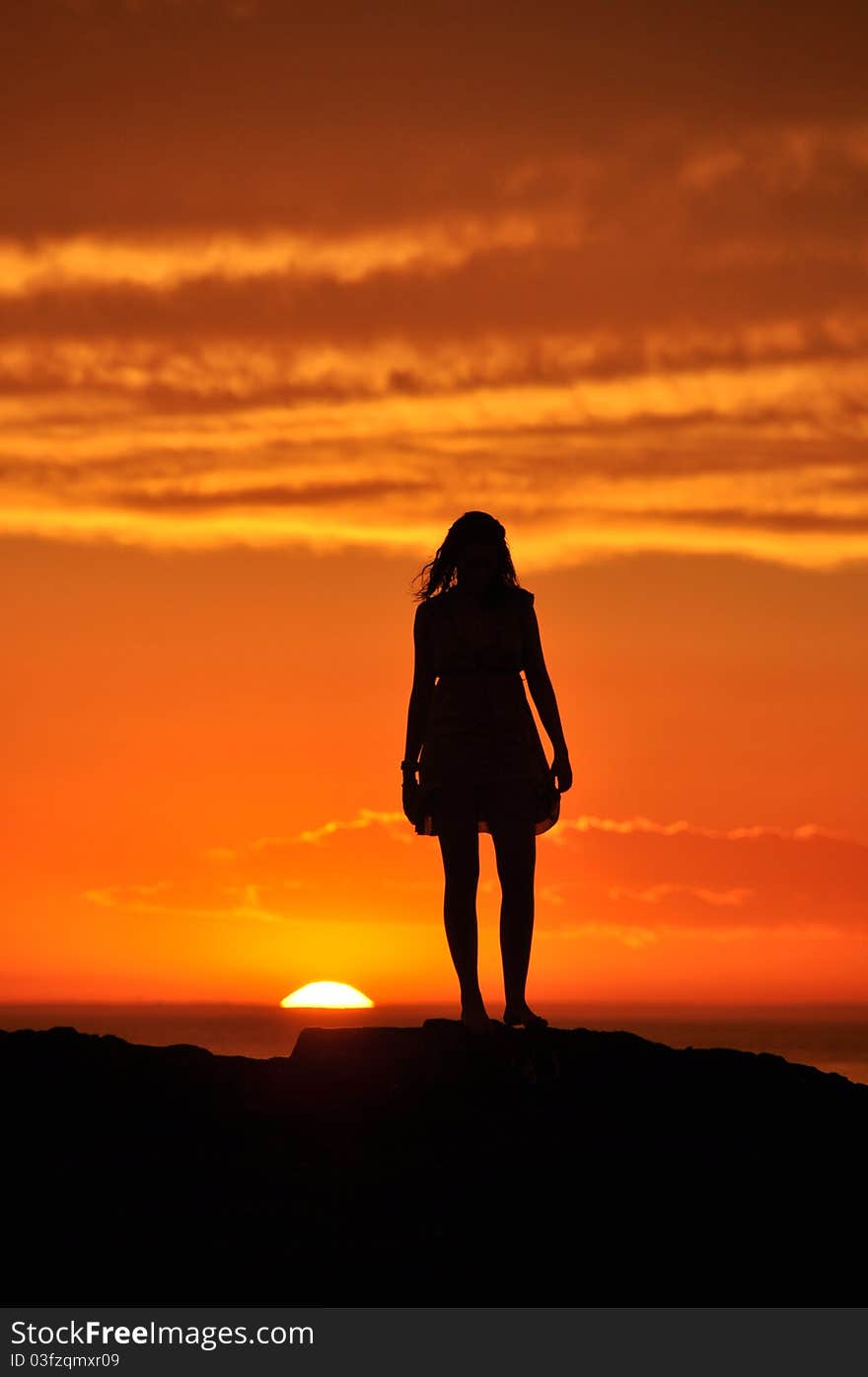 Girl Bathing In Last Rays Of The Sun