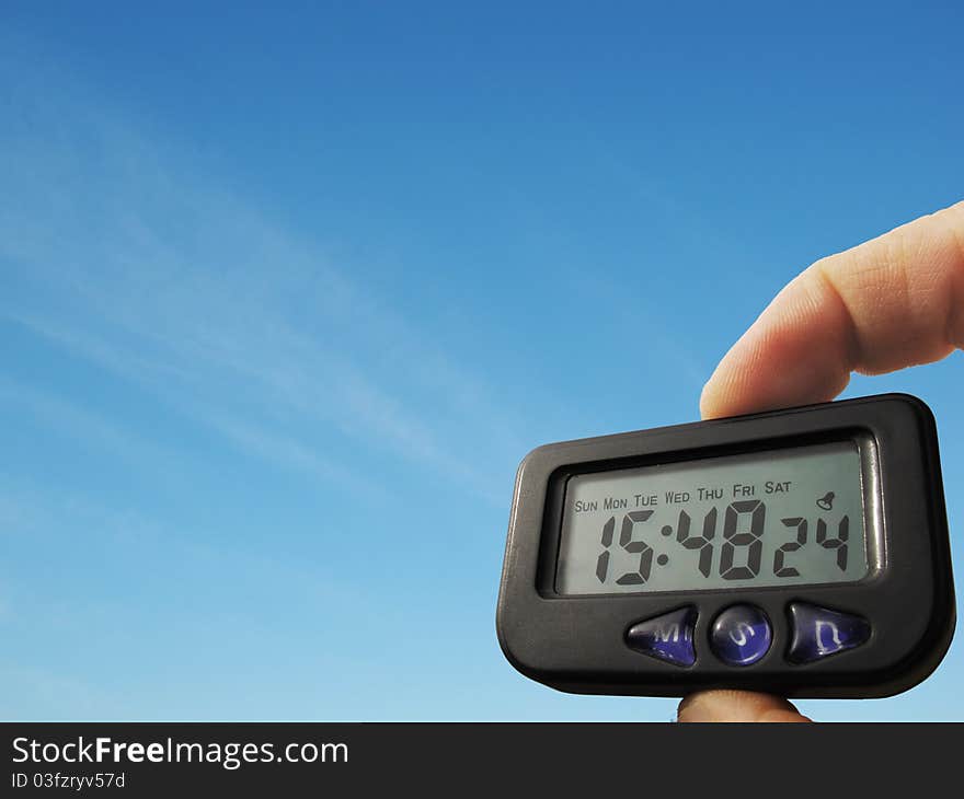 Digital clock on a background sky. Digital clock on a background sky