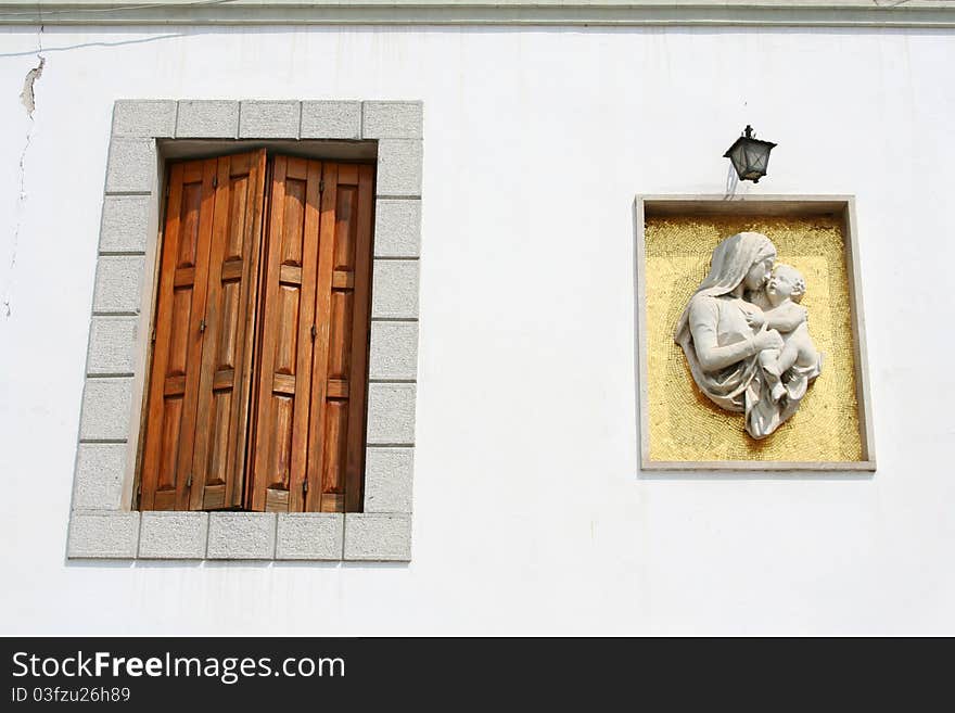 Window with sculpture