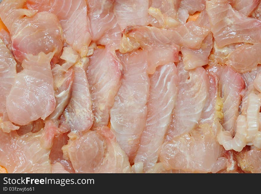 Background Of Slices Of Raw Fish Meat Ready For Cooking