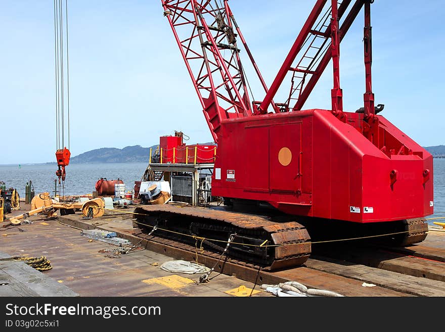 A heavy duty crane on a barge in Astoria Oregon. A heavy duty crane on a barge in Astoria Oregon.