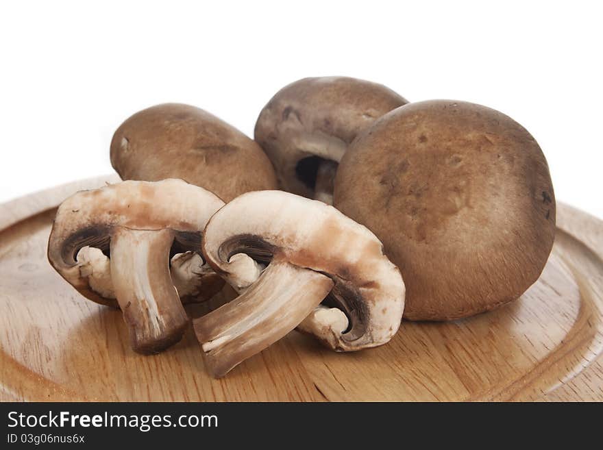 Fresh Baby Portobello Mushrooms on Cutting Board