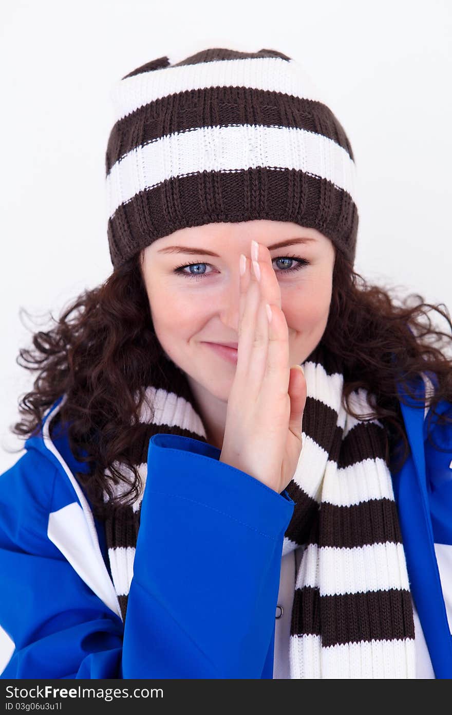 Young pretty woman wearing winter hat and scarf. Young pretty woman wearing winter hat and scarf