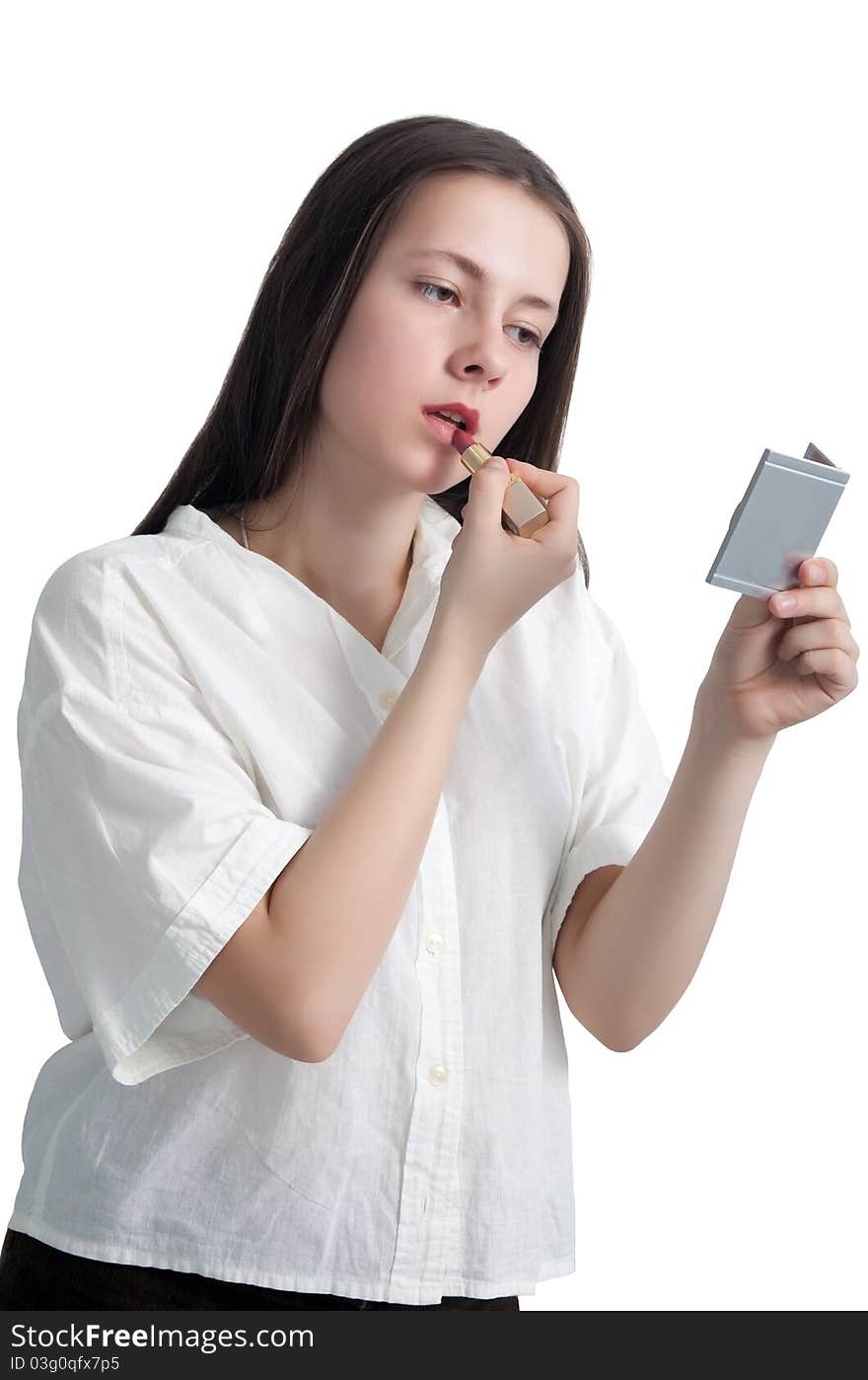 A young girl with her hair applying lipstick isolated on white background