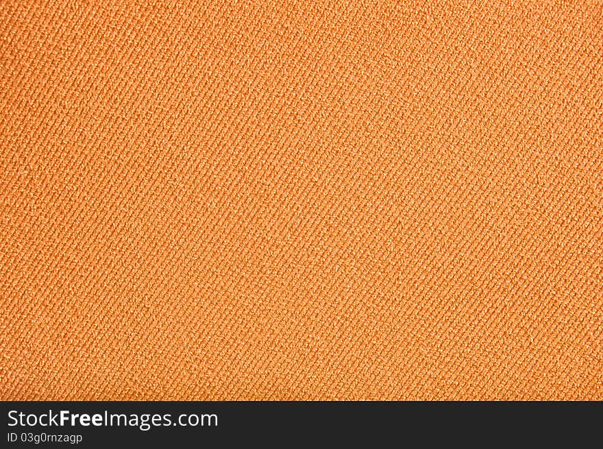 Weaving background of orange fabric. Weaving background of orange fabric