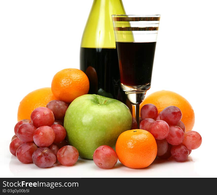 Wine and fruit on a white background