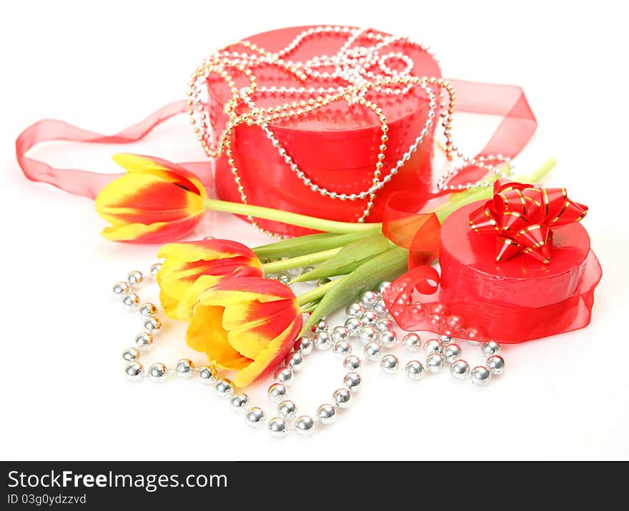 Bouquet of tulips and gift