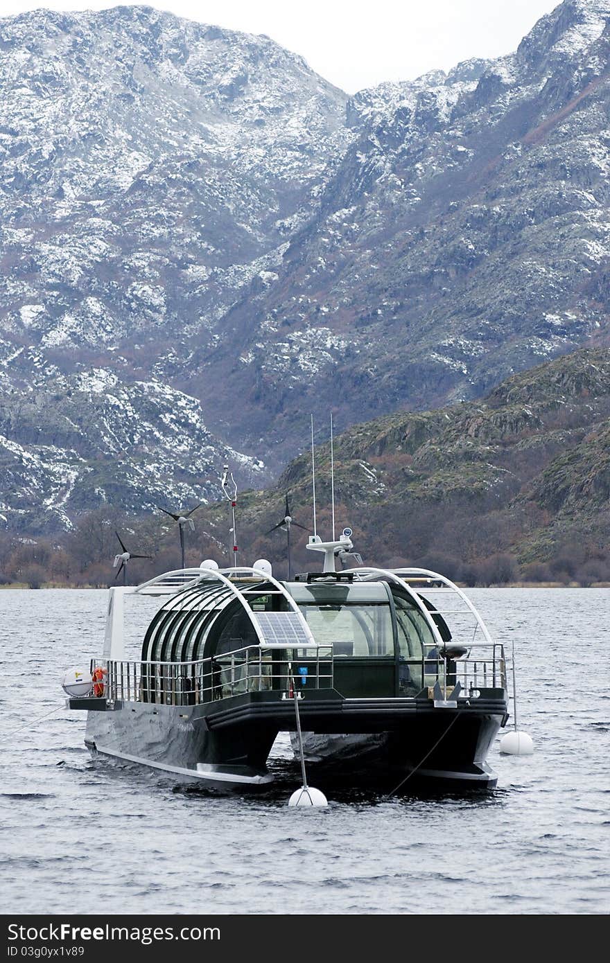 Anchored scenic boat at Spain's Sanabria lake. Anchored scenic boat at Spain's Sanabria lake