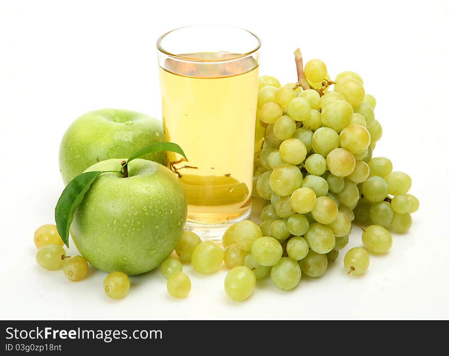 Fresh fruit and juice on a white background