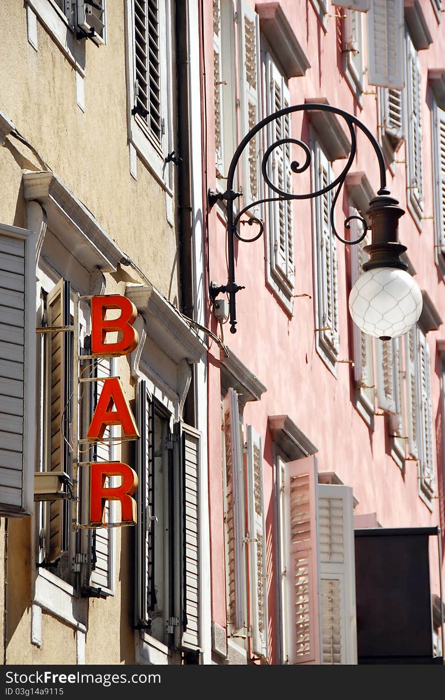 Street Lamp And Bar Sign