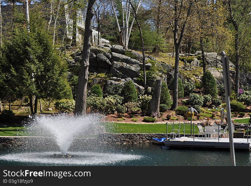 A beautiful fountain created in a backyard by home's owner. A beautiful fountain created in a backyard by home's owner.