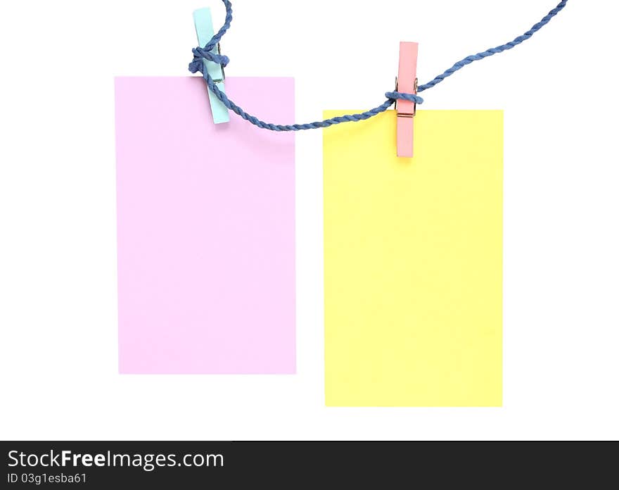 Two notepad with clips and yarn isolated on white background