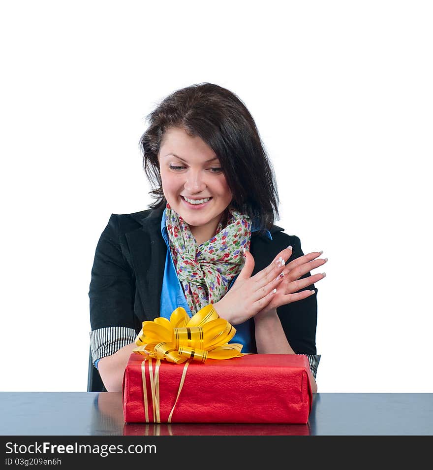 The beautiful girl has received a box with a gift