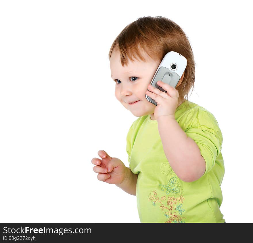 Surprised little girl with  phone isolated