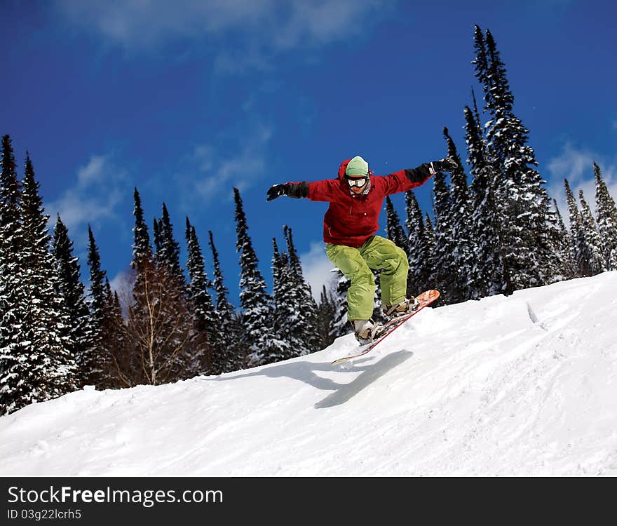 Snowboarder jumping