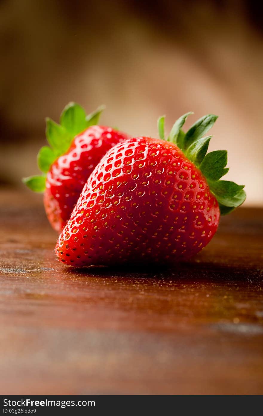 Strawberries on wooden table