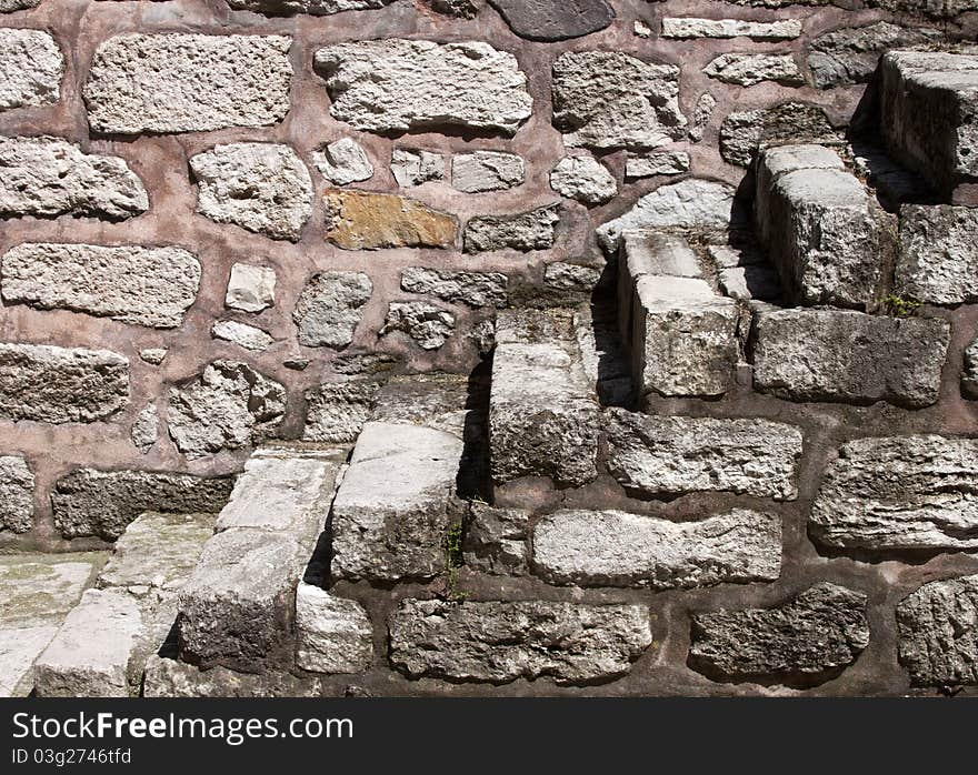 Stairs and wall made from stones. Stairs and wall made from stones