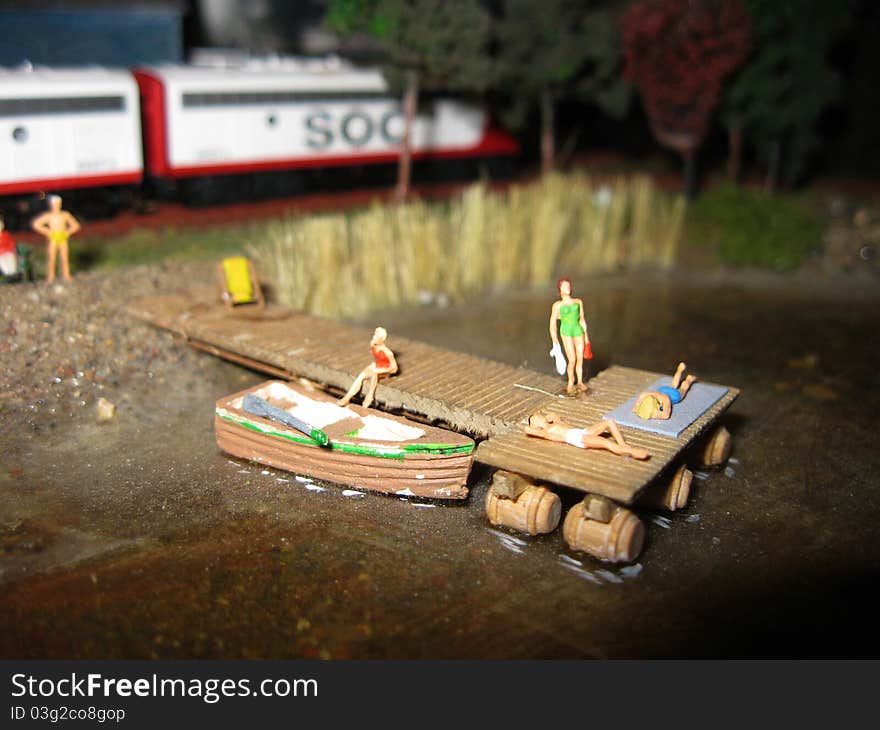 Plastic models on a boat dock