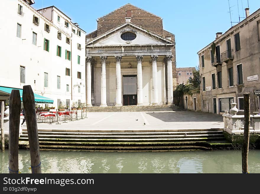 Church behind a canal in venice