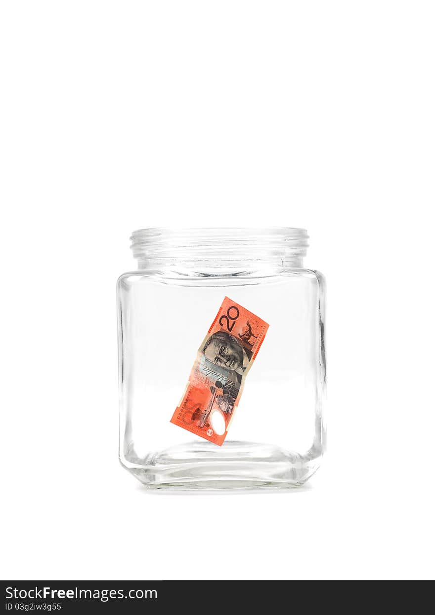 An empty money jar against a white background. An empty money jar against a white background