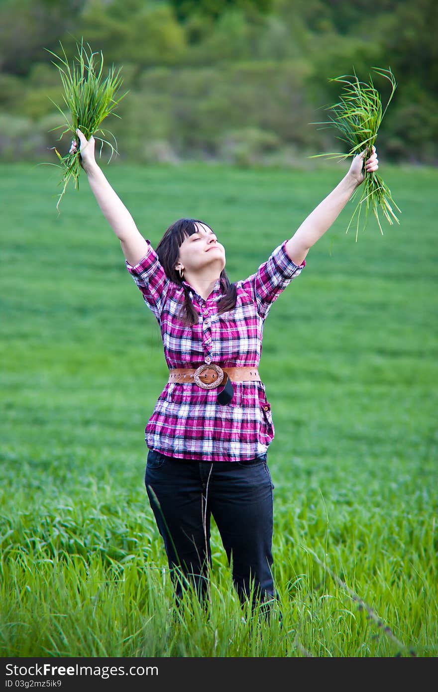 Girl in green field