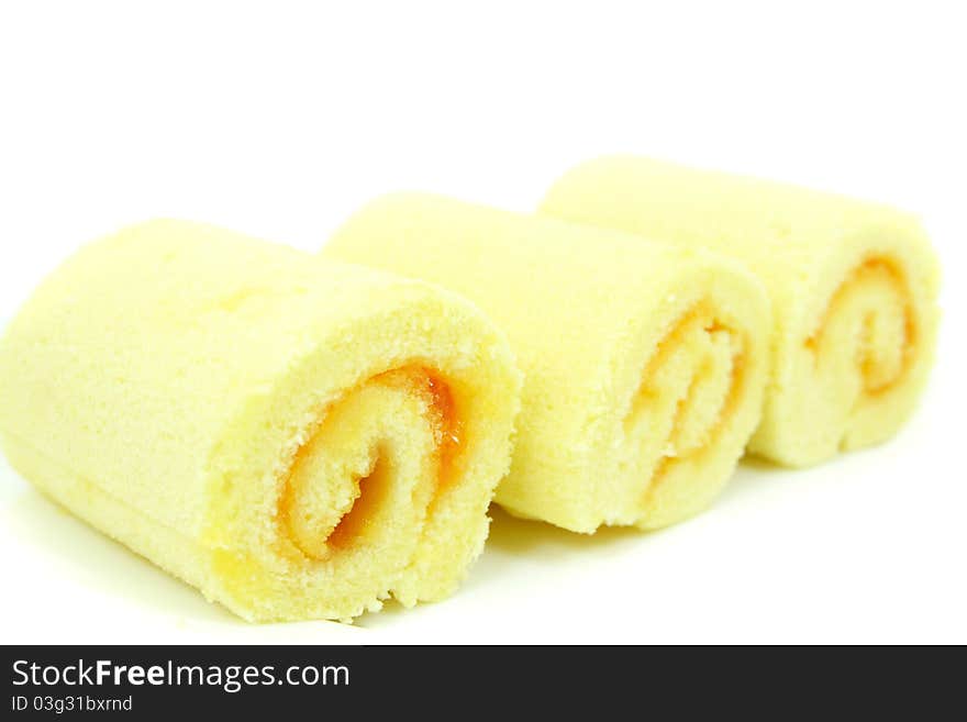 Orange Rolls cake isolated on white background