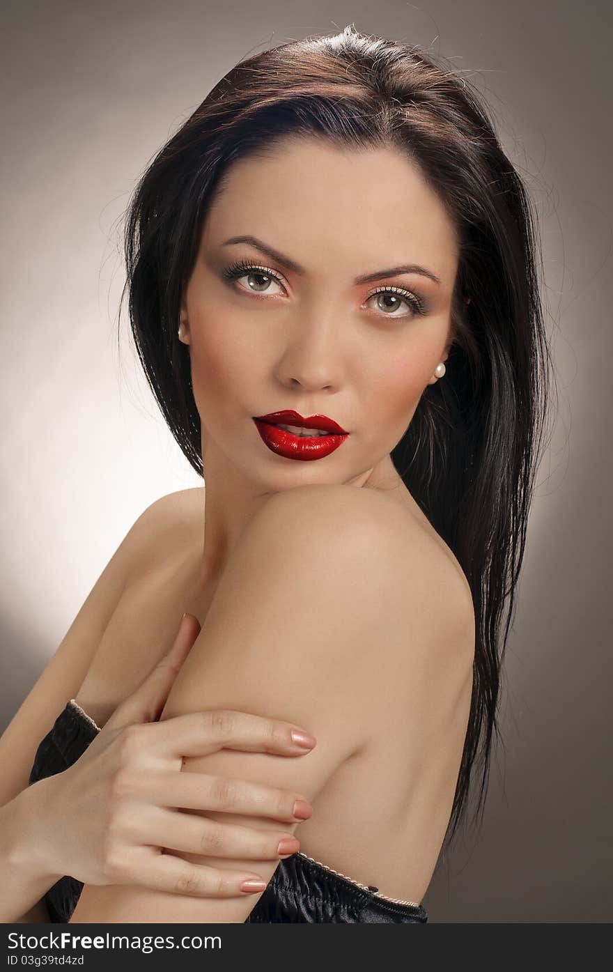 Portrait of beautiful brunette girl with beautiful red lips. Portrait of beautiful brunette girl with beautiful red lips