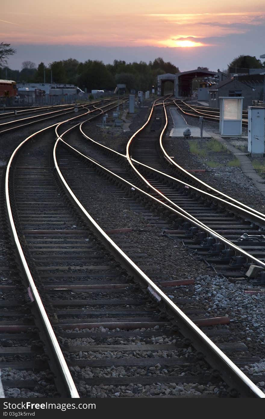 Railway Tracks At Dusk