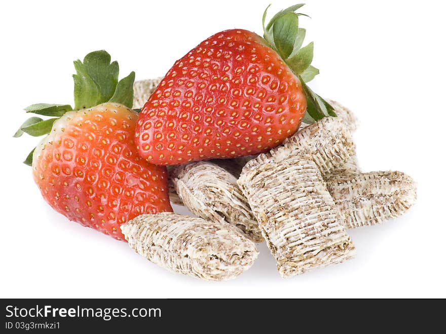 Wheat cereal with strawberries over white background - isolated. Wheat cereal with strawberries over white background - isolated