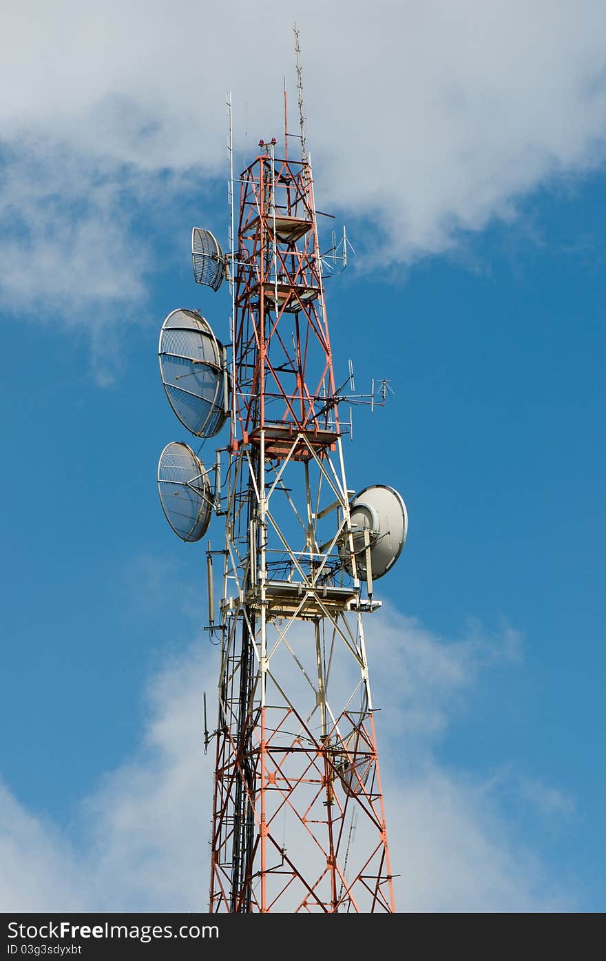 Telecommunication mast with sky background