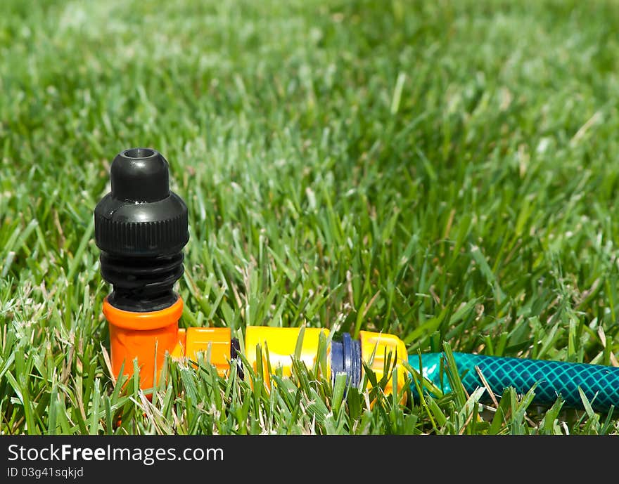 Watering the Lawn with Sprinkler