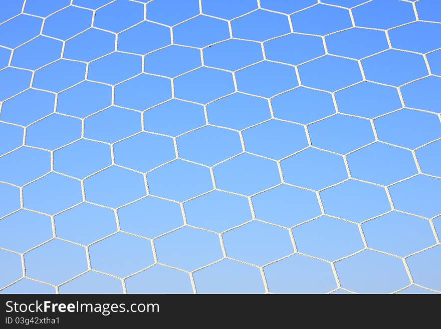 Net of football goal in blue sky. Net of football goal in blue sky