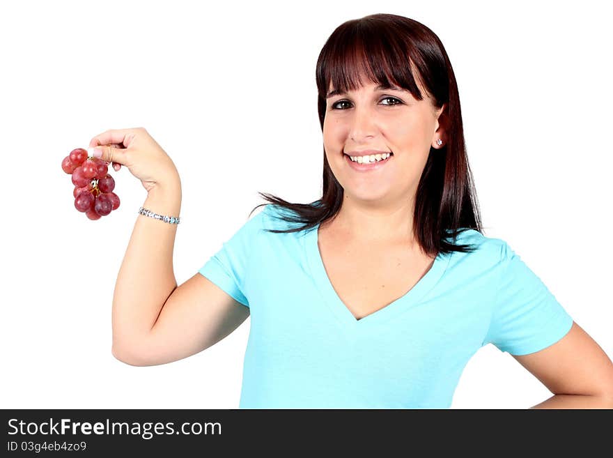 Woman holding a bunch of red grapes on a white background. Woman holding a bunch of red grapes on a white background